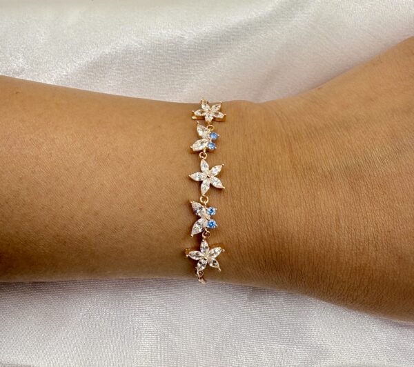 92.5 Sterling Silver Rose Gold-Plated Starflower Bracelet with CZ and Blue Accent - Image 2