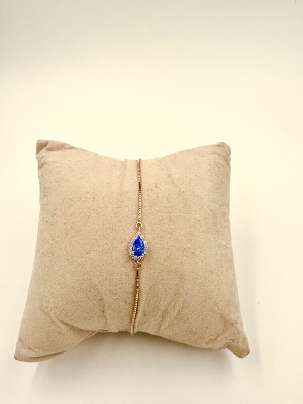 Sterling Silver Adjustable Bracelet with Blue Teardrop CZ Pendant