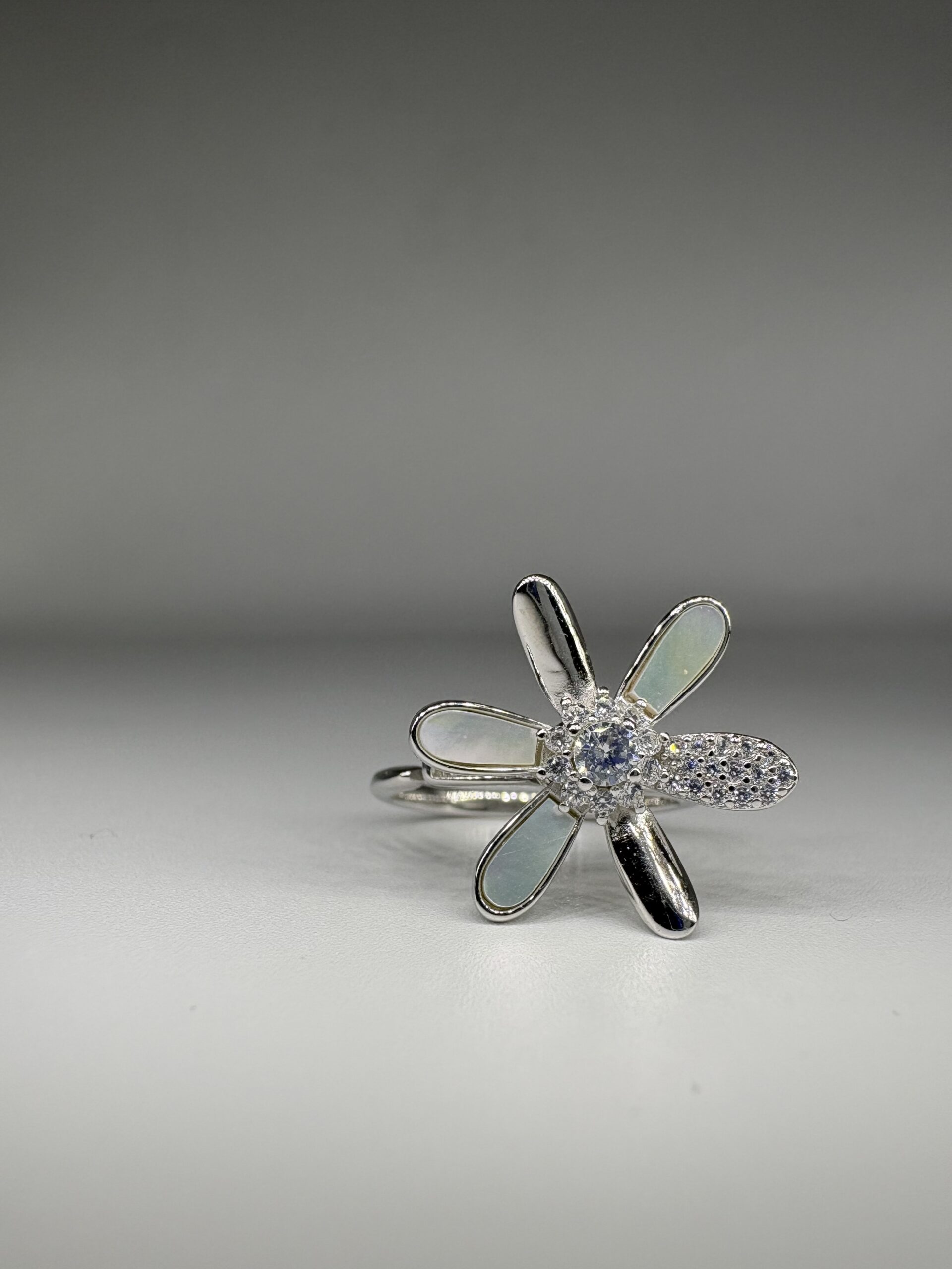 92.5 Sterling Silver Spinning Flower CZ Adjustable Ring